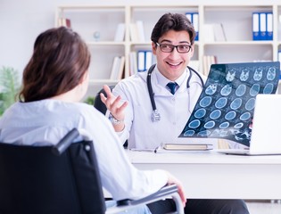 Doctor explaining to patient results of x-ray imaging