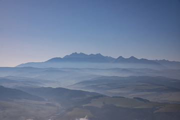 Naklejka na ściany i meble Tatra mountains in fog - Poland