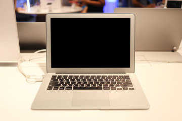 Laptop placed on a desk and with a blank screen.