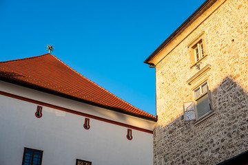 Fototapeta na wymiar Reed roof at Stone gate on Upper town in Zagreb, Croatia in early summer morning, popular touristic destination, architectural detail
