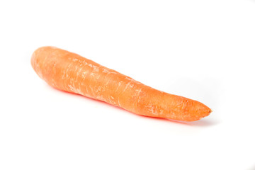 Ripe orange carrots on a white background isolate