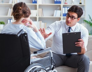 Patient visiting psychotherapist to deal with consequences of tr