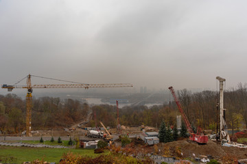 Construction work with the use of heavy special equipment and high-rise erecting cranes,...