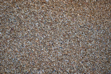 Sand background. Background for design. Sand texture. Close up of sand pattern. Top view. Copy space.
