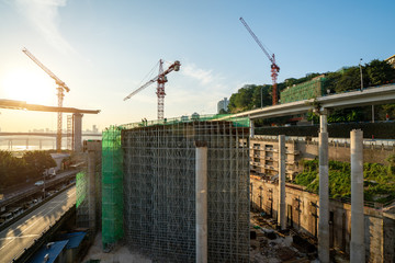 Tower cranes, skyscrapers on construction sites