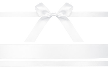 White ribbon with gift bow isolated on white. Festive bow of white shiny satin ribbon and line of ribbon