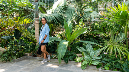Asian woman in botanical garden