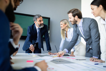 Group of architects and business people working together and brainstorming