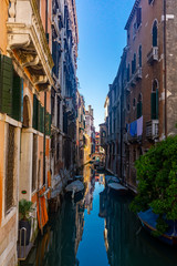 Fototapeta na wymiar Bright colorful houses on Venetian lagoon, Venice