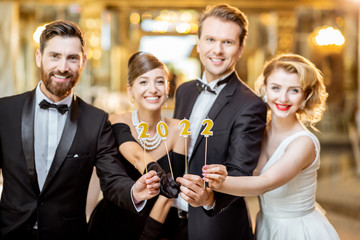 People celebrating New Year holiday indoors