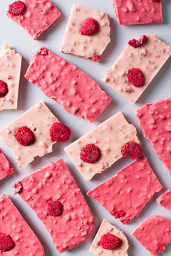 Bar of ruby or pink chocolate flat lay