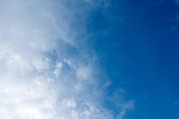 Natural clear blue sky with some clouds cloudscape for background or backdrop freedom concept