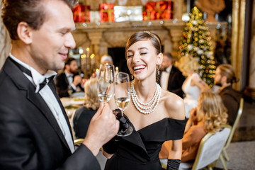 Elegant couple celebrating New Year holiday
