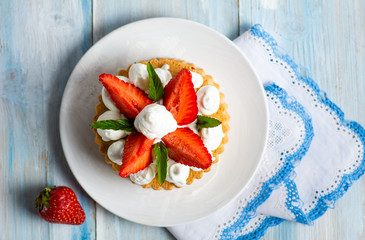 Strawberry dessert with sweet cream
