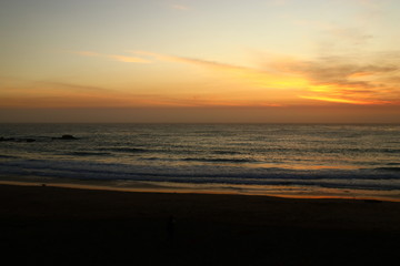 Fototapeta na wymiar Sunset on Moonstone beach in Cambria California 