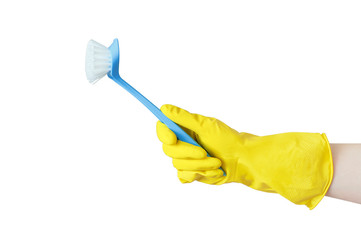 Blue brush for cleaning in hand. White isolate. Close-up.