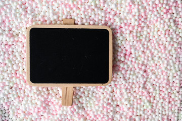 Blackboard against Colorful Polystyrene foam background space for text