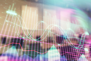 Stock market chart with trading desk bank office interior on background. Double exposure. Concept of financial analysis