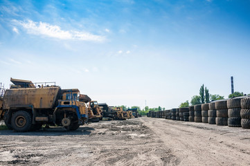 remains of old quarry trucks and machinery on junk yard