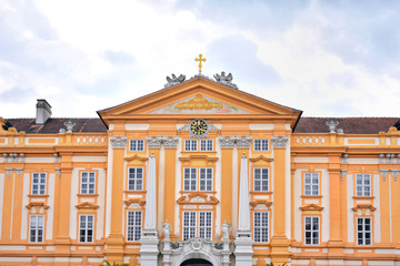 Melk, Austria - April, 2019. Main entrance in Melk Abbey, Benedictine abbey above the town of Melk, Lower Austria. Beautiful main courtyard of the Benedictine abbey. Beutiful view of Stift Melk Abbey.