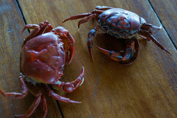 Rice field crabs boiled on the wooden table