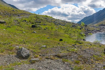 Mountains with reflection in the lake. Hibiny mountains, Arctic circle, Kola peninsula, Murmansk region, Russia