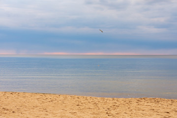 Sad day at the sea. Calm water