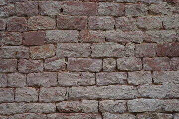 Ziegelsteinfläche einer historischen Mauer
