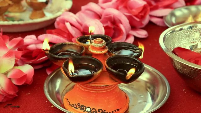 Traditional south indian ceramic oil lamp 'Nilavilakku' on wedding ceremony, Nilavilakku is lighted before starting the rituals