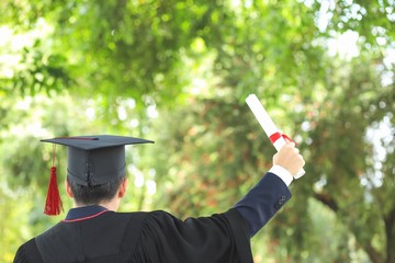 young graduate with diploma