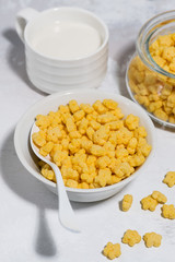breakfast cereal for children - crispy stars, vertical top view