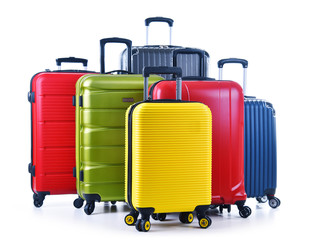 Travel suitcases isolated on white background
