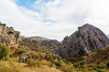 Beautiful landscape of mountains with blue sky behind