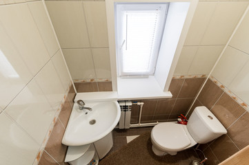 Russia, Moscow- June 11, 2019: interior room apartment. standard repair decoration in hostel. bathroom and toilet