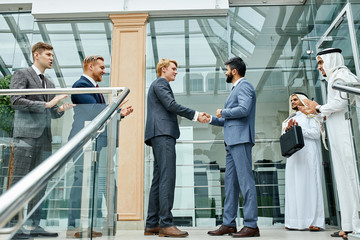 Positively finished deal between caucasians and sheikhs