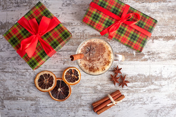 Traditional Homemade Winter Eggnog Cocktail with Whipped Cream and Cinnamon for Christmas Eve and Winter Holidays. Selective Focus. Copy Space. Toned image.