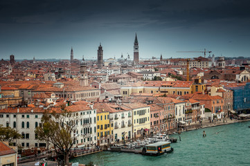 Fototapeta premium Beautiful cloudy sky over Venice aerial panorama, Italy. Concept: historic Italian places, evocative and little-known views of Venice