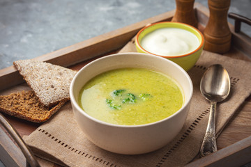 Homemade broccoli cream soup, vegetarian food.