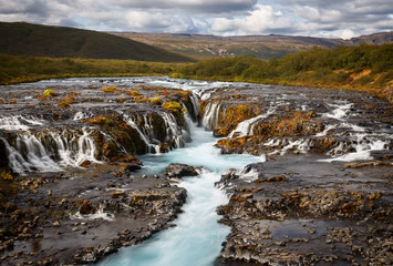 Beautiful Turquoise Bruarfoss Waterfall, Iceland