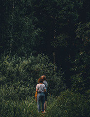 couple walking in forest