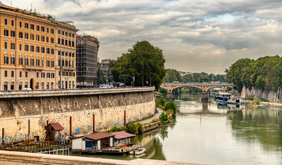 Naklejka premium View of river Tiber at the city of Rome, Italy.