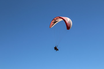 Paragliding in the mountains. The coast of the Mediterranean Sea. Kemer, Turkey.