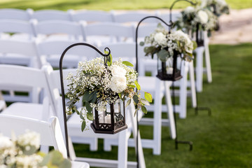 wedding aisle with hanging lanterns