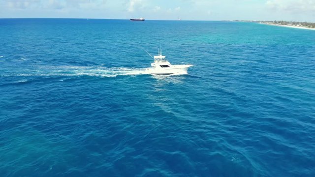Yacht Cruise Sailing Smooth In Near Harbor Area Bahamas.