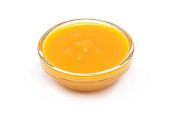 Mango Puree in glass Bowl, Mango Fruit Puree isolated on white Background