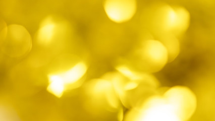Abstract beautiful light bokeh golden and yellow circle background