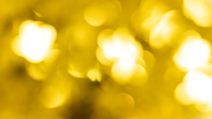 Abstract beautiful light bokeh golden and yellow circle background