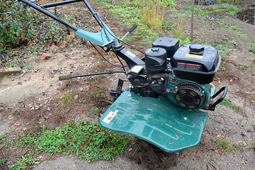 Motocultivator after plowing the garden.