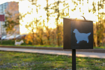 Dog waste bin. Pet waste station in park.