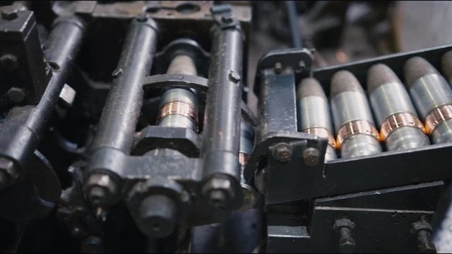 bullets transported on automatic production line in workshop